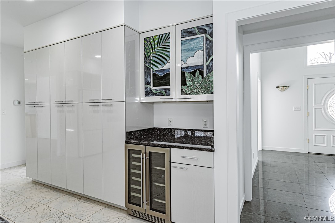 13510 Stonegate Road Midlothian, VA 23113 - Photo 18 of 50 a kitchen with white cabinets and white appliances