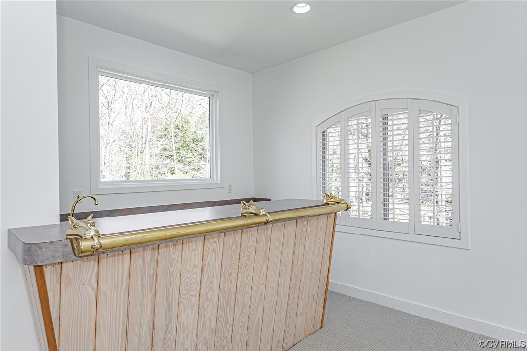 13510 Stonegate Road Midlothian, VA 23113 - Photo 26 of 50 a bathroom with a granite countertop sink and a window