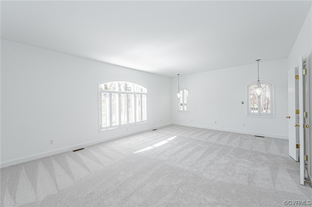 13510 Stonegate Road Midlothian, VA 23113 - Photo 30 of 50 an empty room with windows