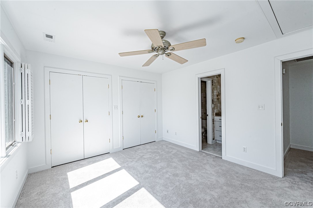 13510 Stonegate Road Midlothian, VA 23113 - Photo 37 of 50 a view of a livingroom with a ceiling fan and window
