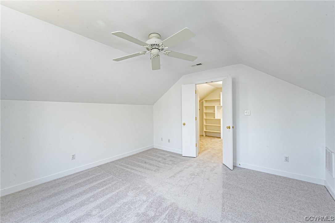 13510 Stonegate Road Midlothian, VA 23113 - Photo 45 of 50 an empty room with a ceiling fan and a window