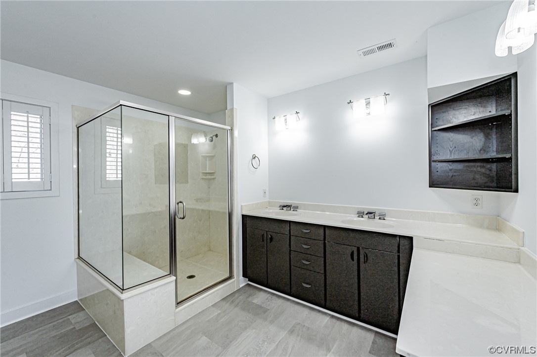 13510 Stonegate Road Midlothian, VA 23113 - Photo 46 of 50 a bathroom with a double vanity sink mirror and double