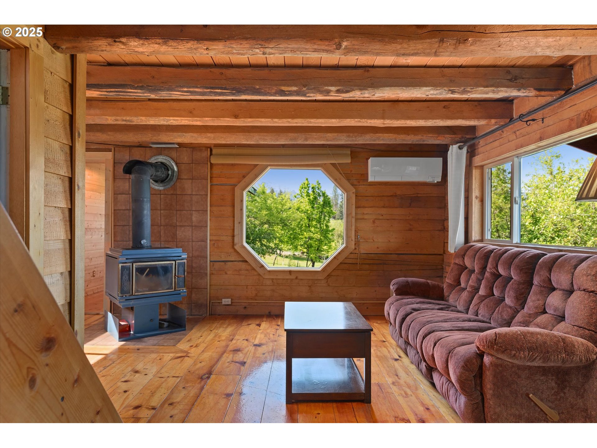 35912 Valley View Lane Halfway, OR 97834 - Photo 15 of 43 a living room with a couch and a window