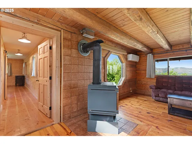 a kitchen that has a table and chairs in it