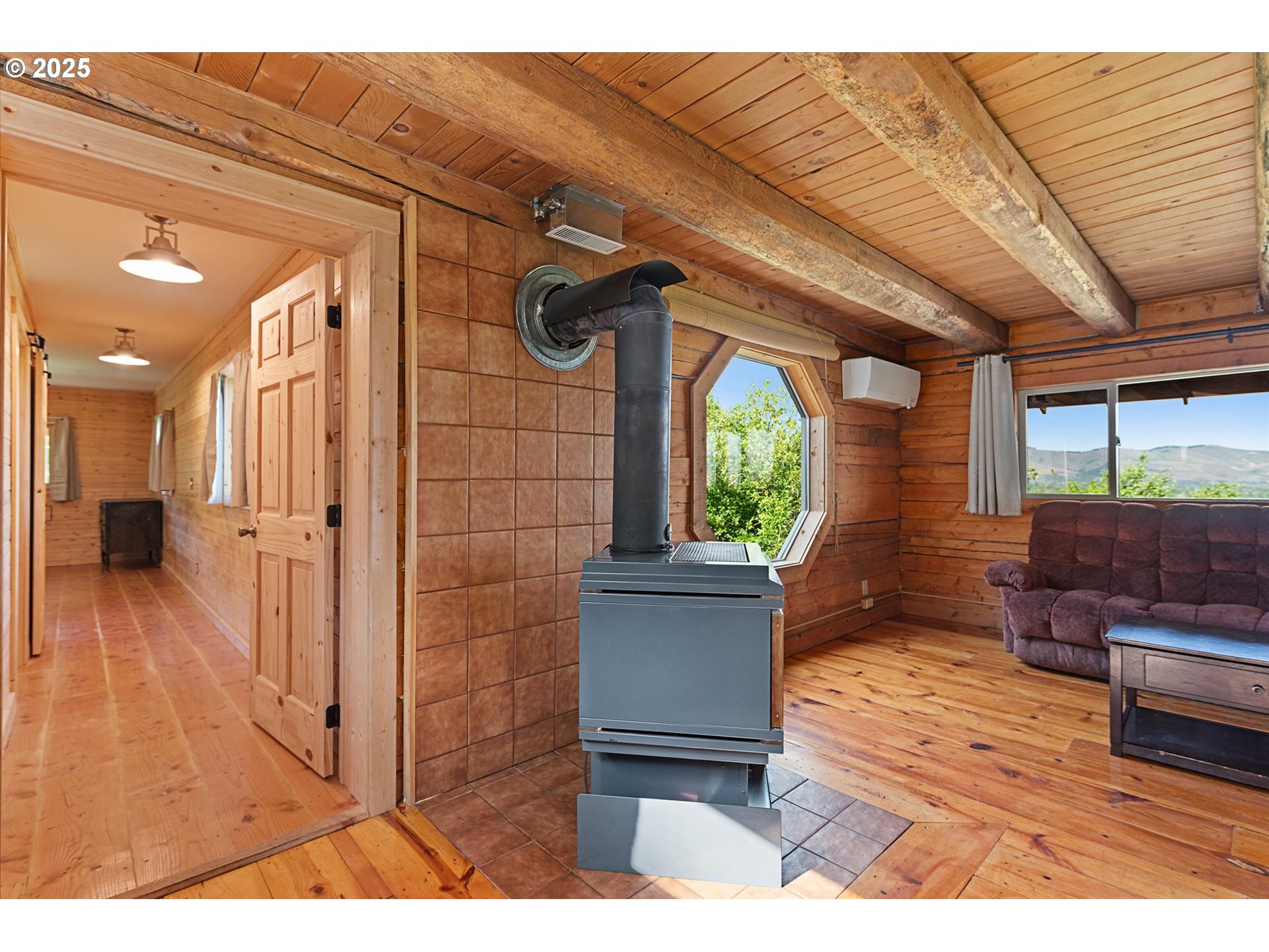 35912 Valley View Lane Halfway, OR 97834 - Photo 17 of 43 a view of a living room and a wooden floor