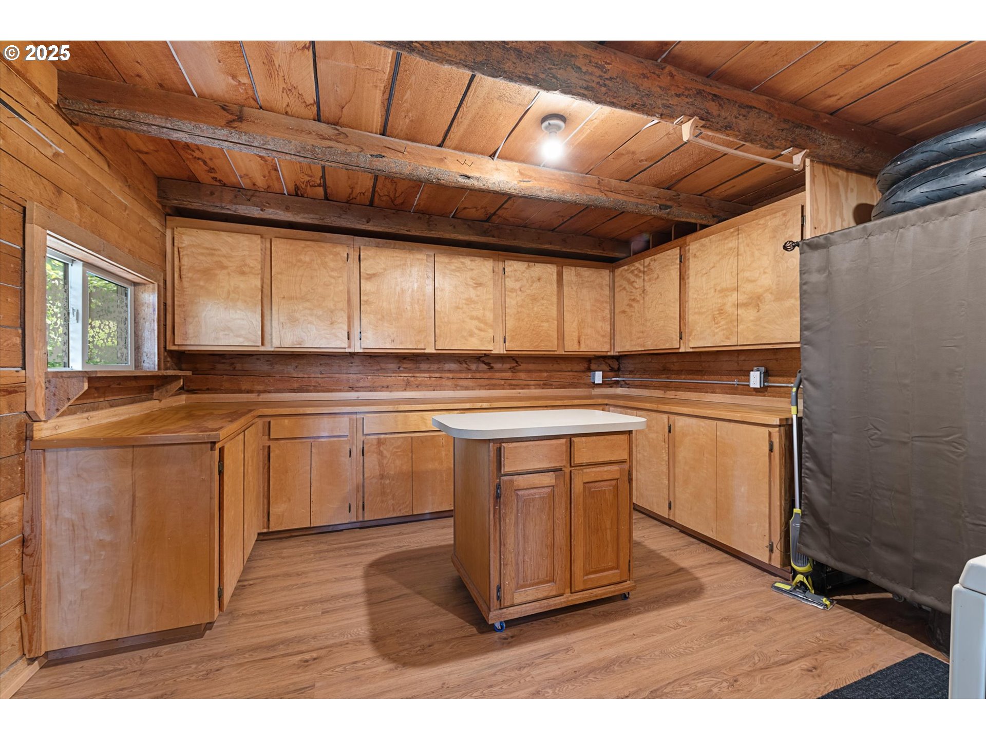35912 Valley View Lane Halfway, OR 97834 - Photo 23 of 43 a kitchen with granite countertop a sink cabinets stainless steel appliances and a window