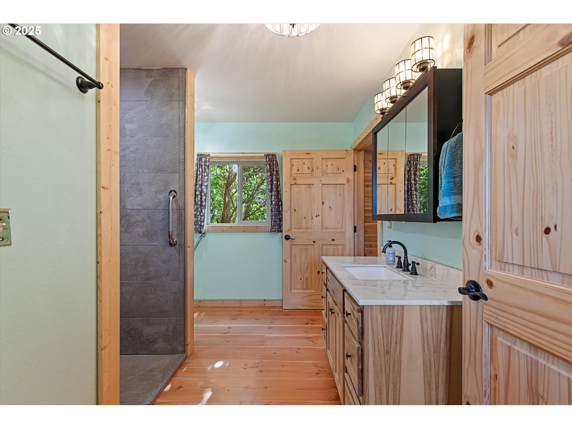 35912 Valley View Lane Halfway, OR 97834 - Photo 27 of 43 a bathroom with a sink and mirror