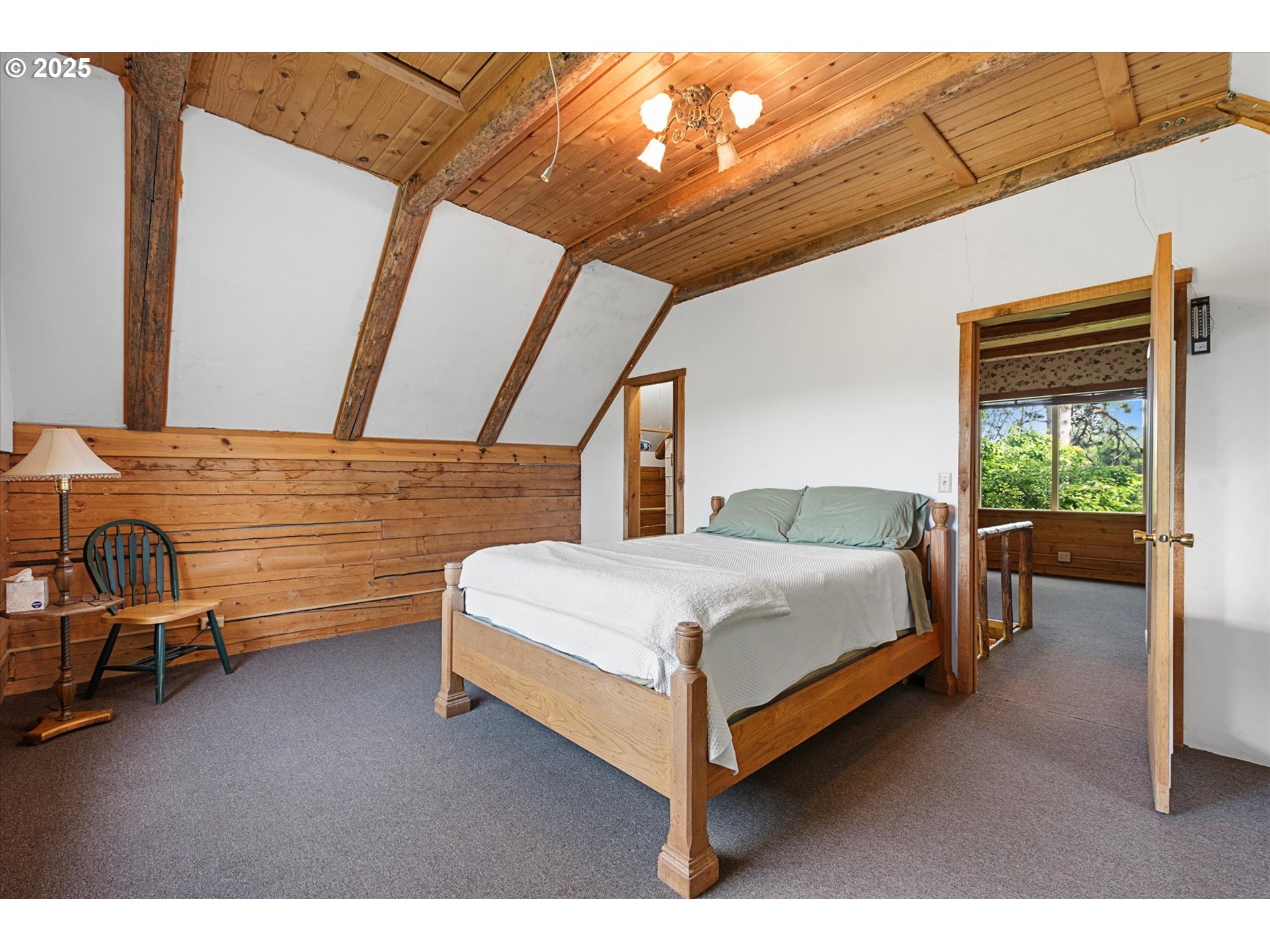 35912 Valley View Lane Halfway, OR 97834 - Photo 35 of 43 a bedroom with a bed chair and a window
