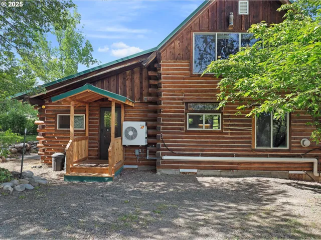 a view of an ocean and a mountain