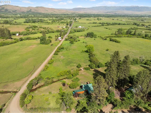 a view of balcony with wooden floor