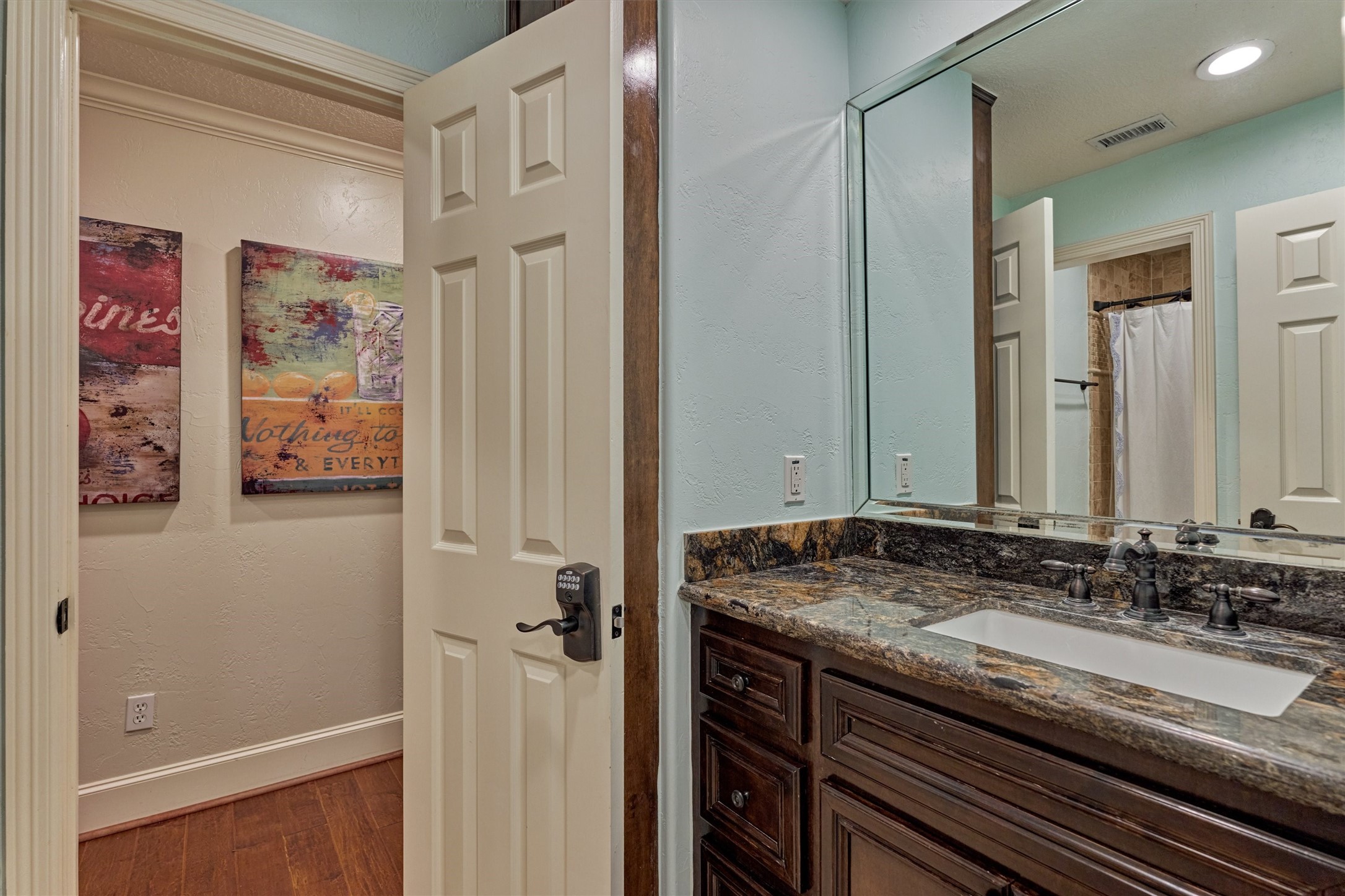 18 Treevine Court The Woodlands, TX 77381 - Photo 34 of 50 Private en suite bathroom for secondary bedroom #3, complete with a walk-in shower.