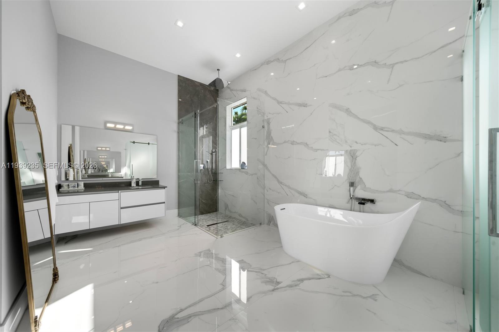 10250 Southwest 135th Street Miami, FL 33176 - Photo 17 of 35 a large bathroom with a bathtub and shower