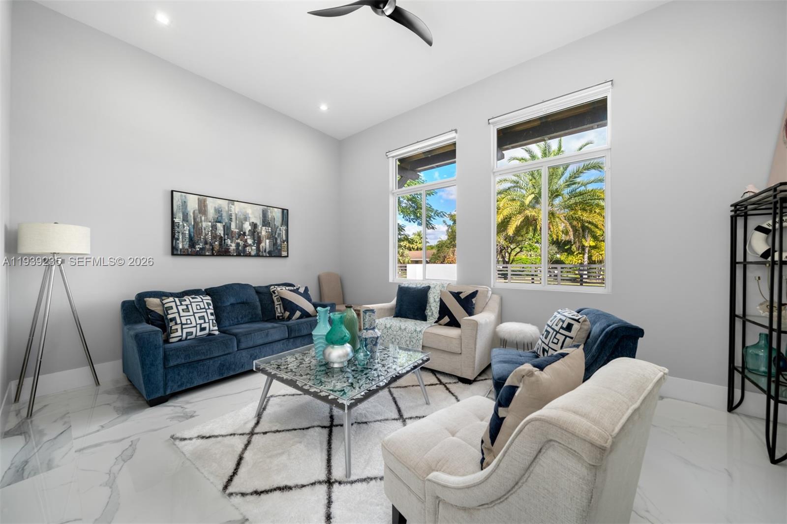 10250 Southwest 135th Street Miami, FL 33176 - Photo 23 of 35 a living room with furniture and a large window