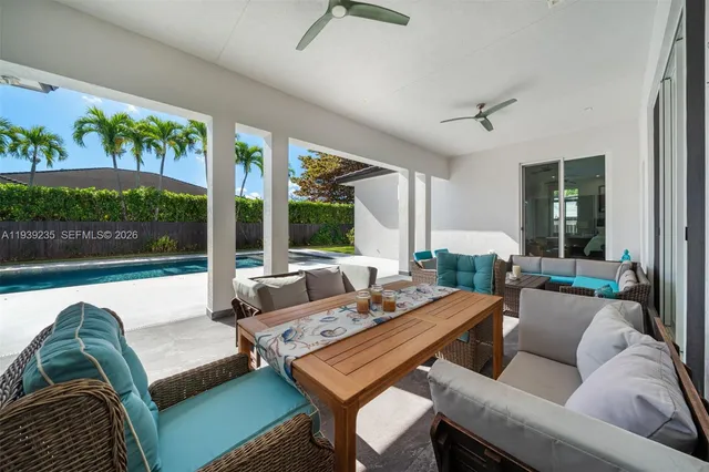 a view of a yard with flower plants