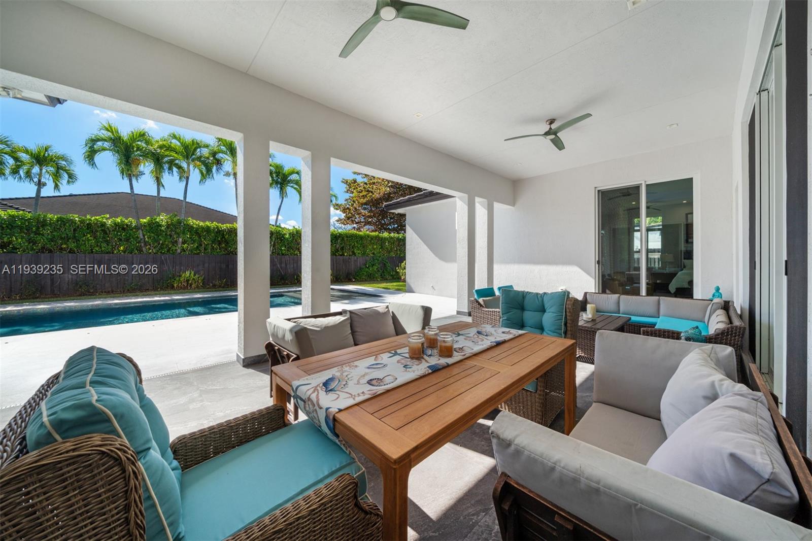 10250 Southwest 135th Street Miami, FL 33176 - Photo 26 of 35 a living room with furniture and a large window