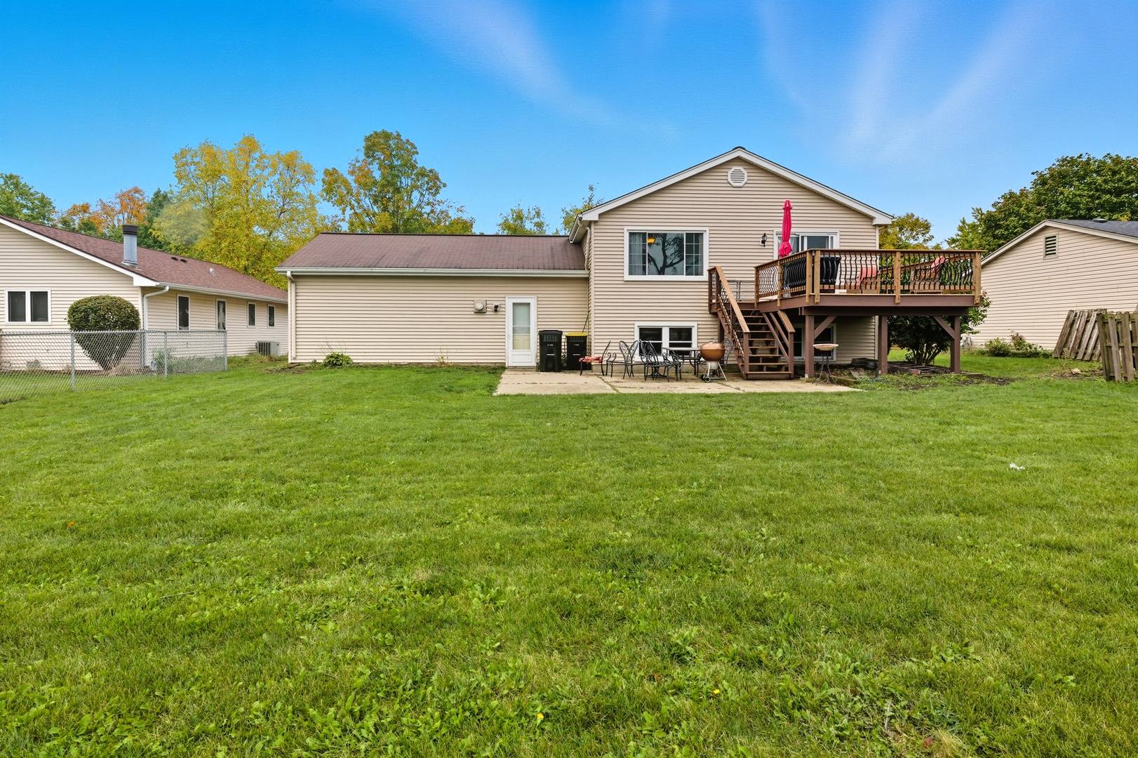 550 Norman Drive Cary, IL 60013 - Photo 17 of 20 a view of a house with a big yard and large trees