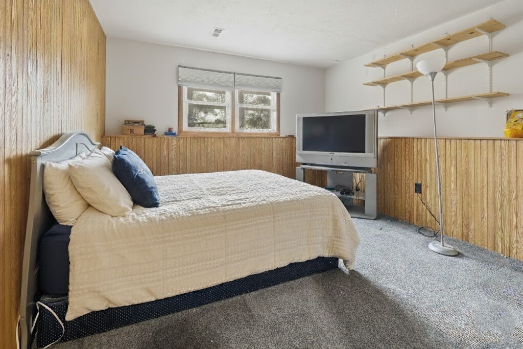 550 Norman Drive Cary, IL 60013 - Photo 10 of 20 a bed sitting in a bedroom and night stand