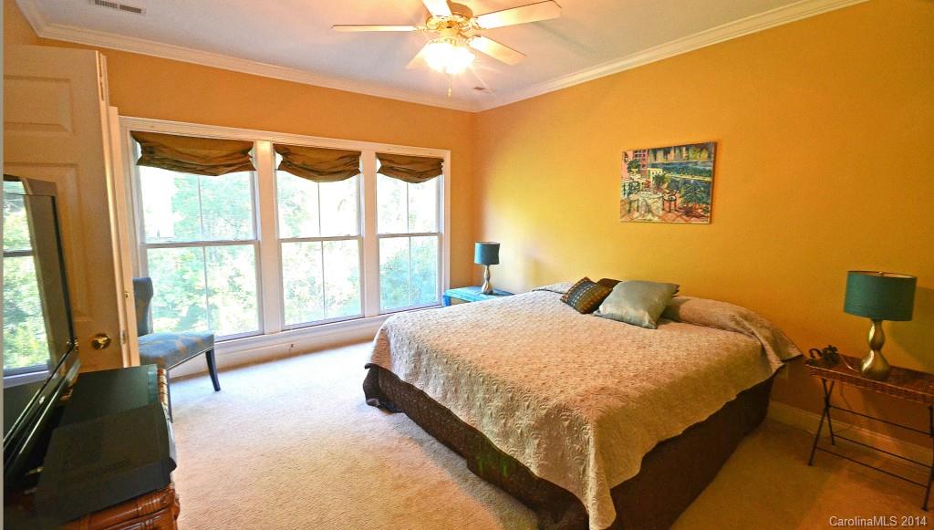 731 Julia Street Fort Mill, SC 29708 - Photo 11 of 20 a bedroom with a bed and a window