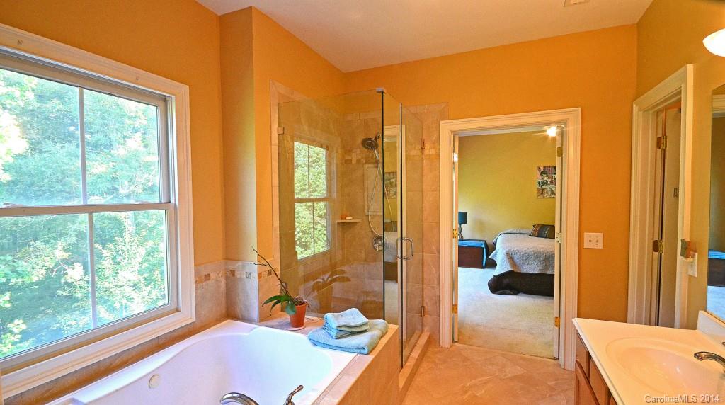 731 Julia Street Fort Mill, SC 29708 - Photo 14 of 20 a spacious bathroom with a tub and shower