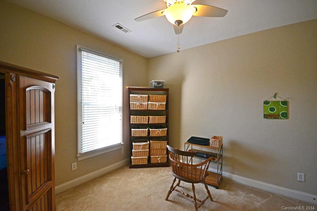 731 Julia Street Fort Mill, SC 29708 - Photo 15 of 20 a view of a workspace with furniture and a window