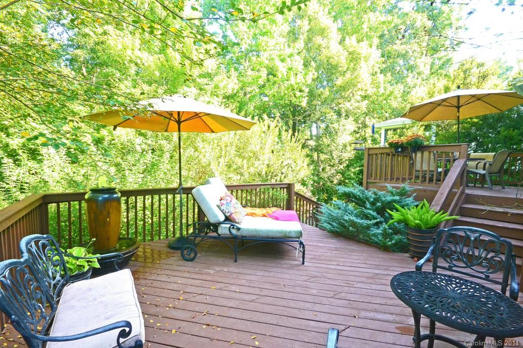 731 Julia Street Fort Mill, SC 29708 - Photo 18 of 20 a balcony with wooden floor table and chairs