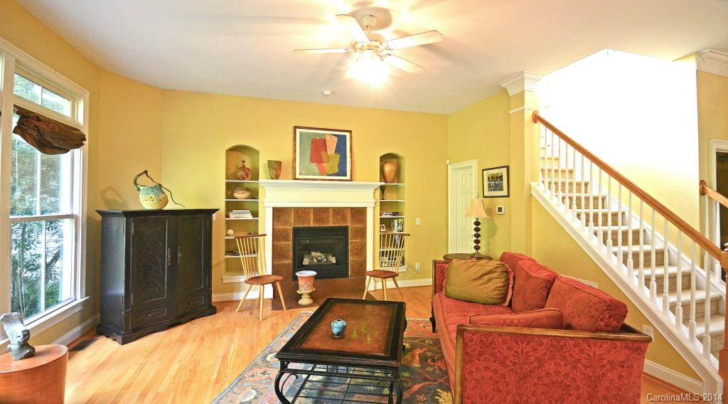 731 Julia Street Fort Mill, SC 29708 - Photo 5 of 20 a living room with furniture fireplace and a flat screen tv