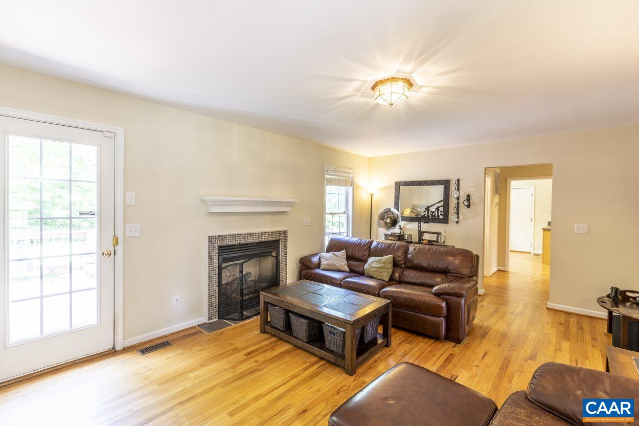 161 Jordan Store Road Kents Store, VA 23084 - Photo 11 of 50 a living room with furniture and a fireplace