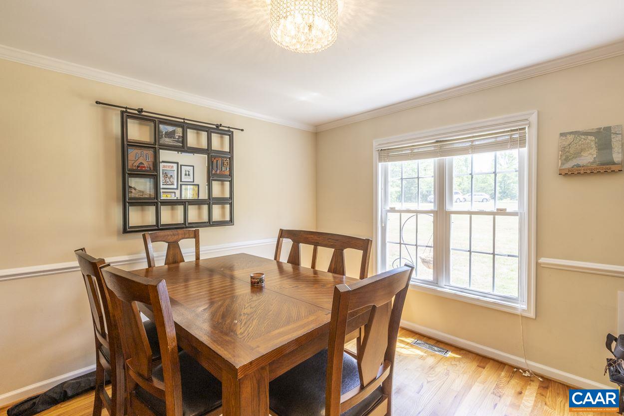 161 Jordan Store Road Kents Store, VA 23084 - Photo 17 of 50 a view of a dining room with furniture and a window