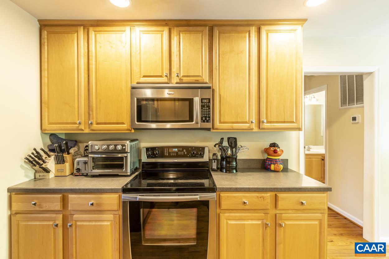 161 Jordan Store Road Kents Store, VA 23084 - Photo 3 of 50 a kitchen with a stove a sink and a microwave