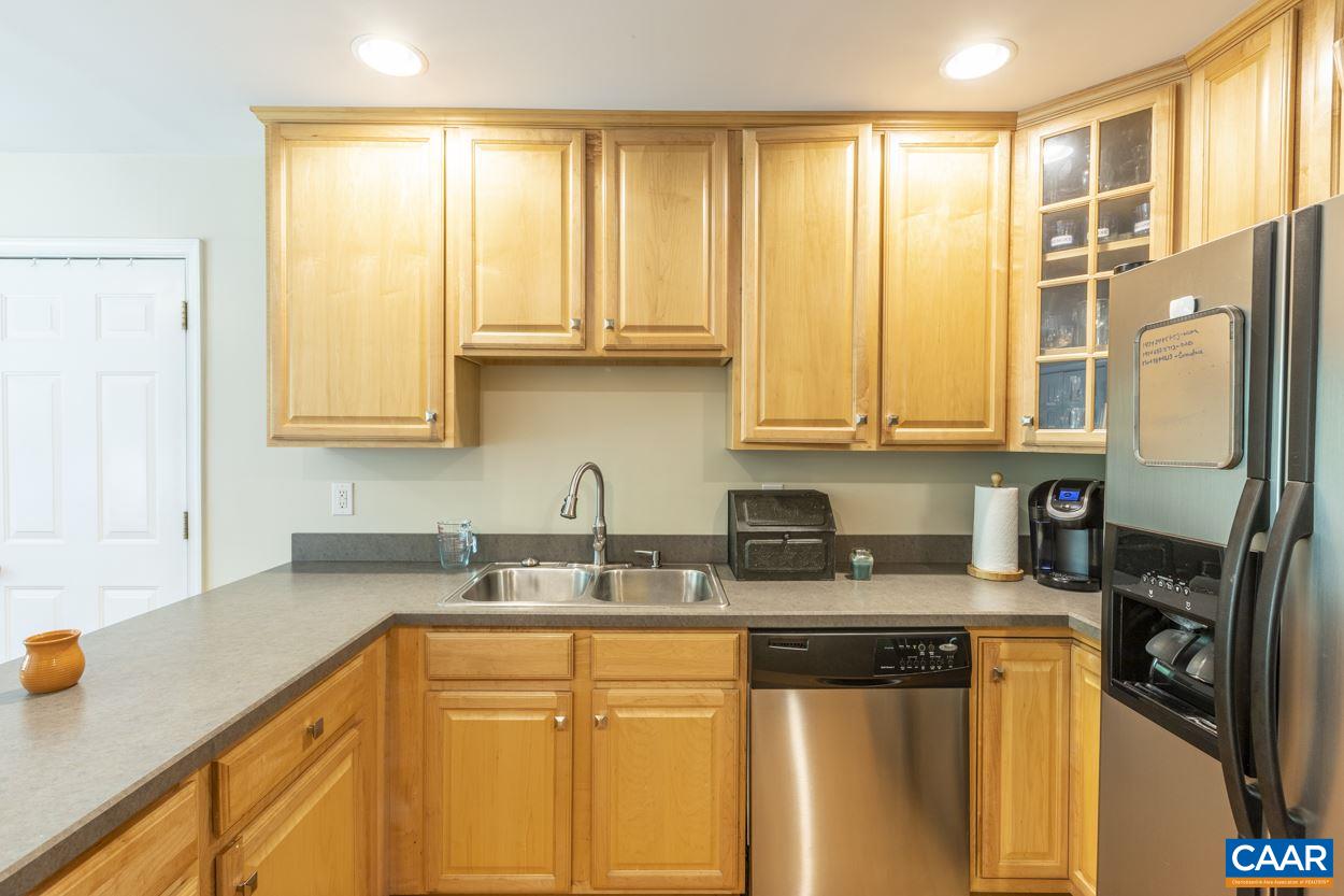 161 Jordan Store Road Kents Store, VA 23084 - Photo 4 of 50 a kitchen with stainless steel appliances granite countertop white cabinets sink and a granite counter tops