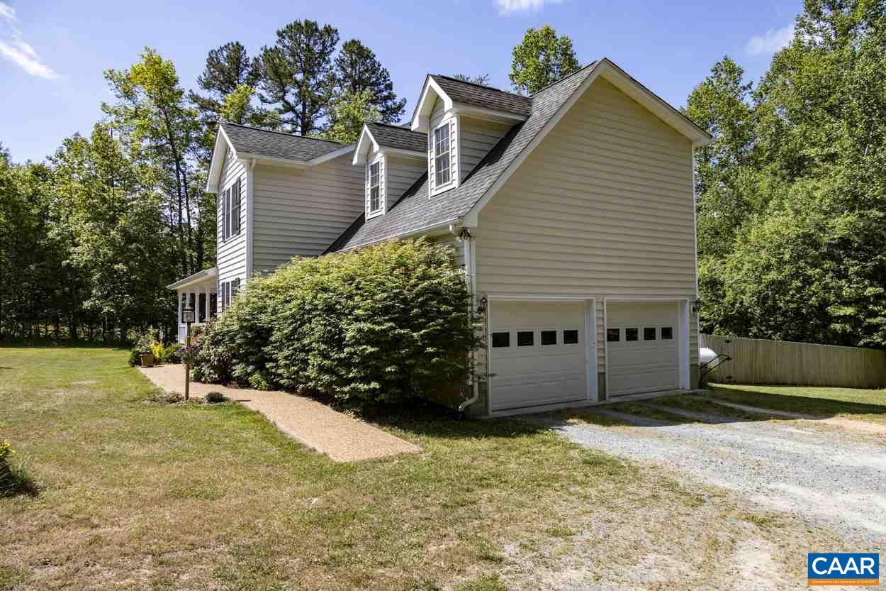 161 Jordan Store Road Kents Store, VA 23084 - Photo 41 of 50 a view of a house with a yard and a garage