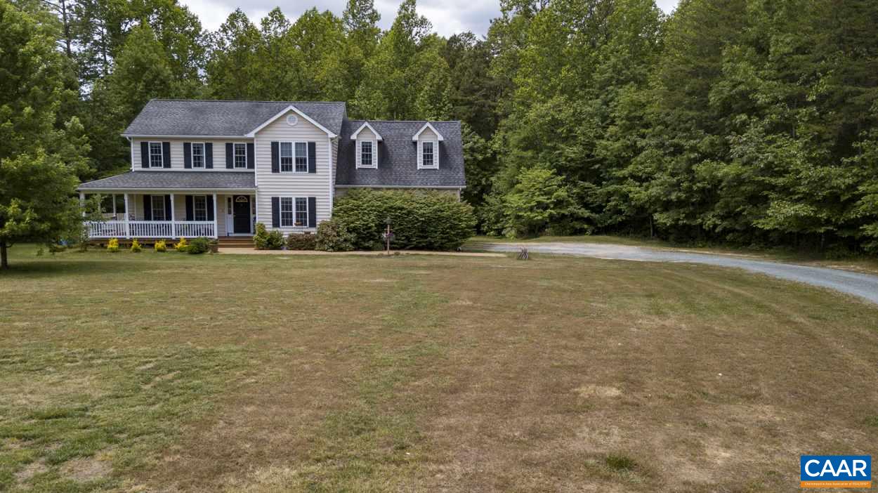 161 Jordan Store Road Kents Store, VA 23084 - Photo 50 of 50 a view of a house with a yard and large trees