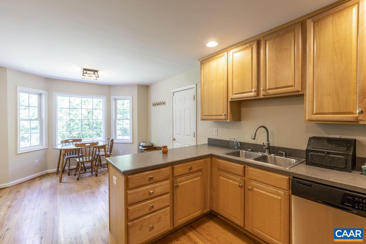 161 Jordan Store Road Kents Store, VA 23084 - Photo 5 of 50 a kitchen with a sink stove and cabinets
