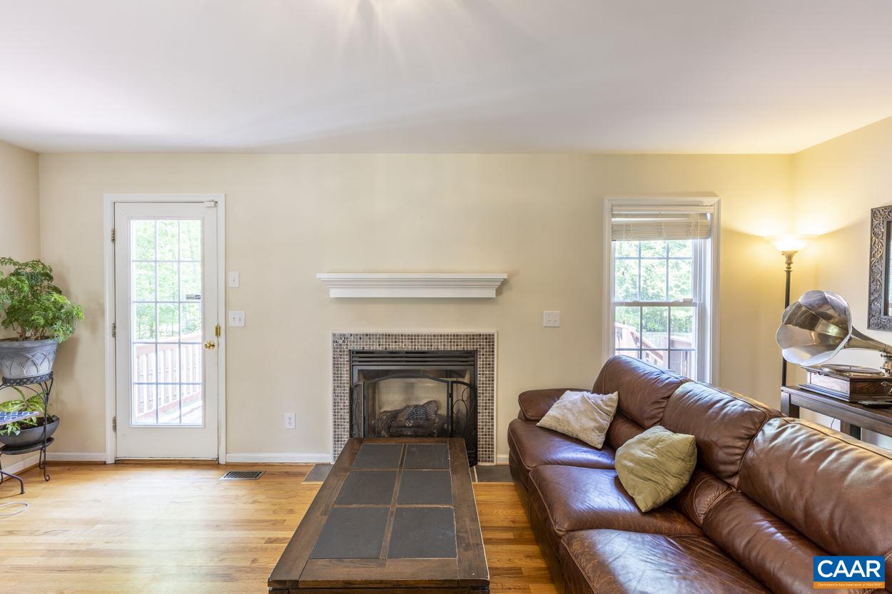 161 Jordan Store Road Kents Store, VA 23084 - Photo 10 of 50 a living room with furniture and a fireplace