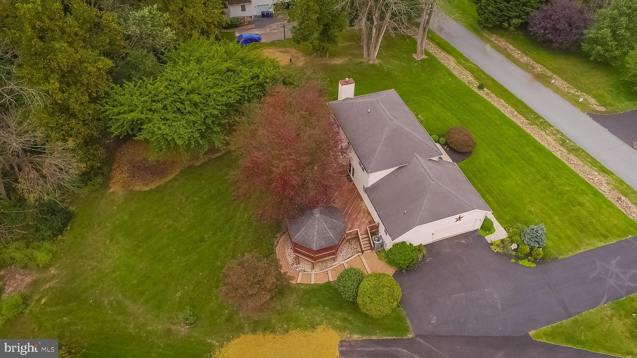 69 Coachman Drive Rising Sun, MD 21911 - Photo 10 of 43 Manicured lot, mature landscape, beautiful blooms