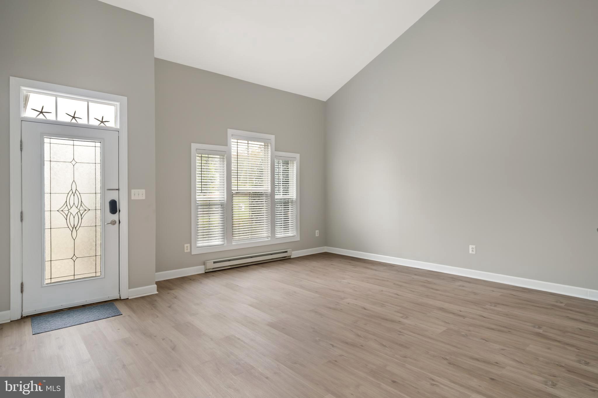 30965 Starling Road, Unit 106D Ocean View, DE 19970 - Photo 3 of 56 New Flooring and painting