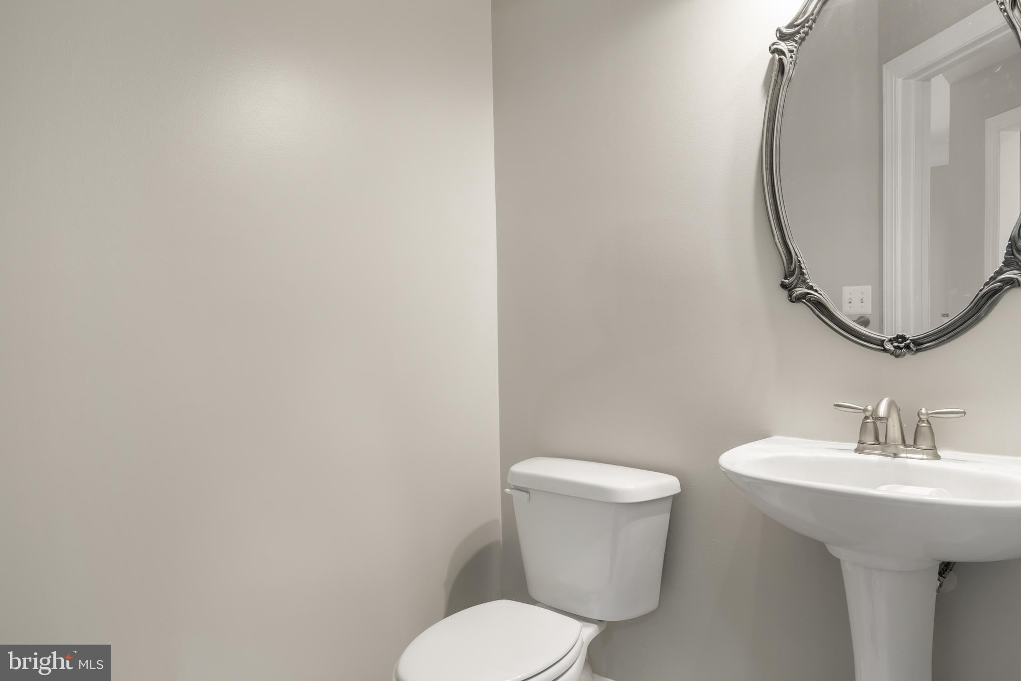 30965 Starling Road, Unit 106D Ocean View, DE 19970 - Photo 9 of 56 Main level Powder room