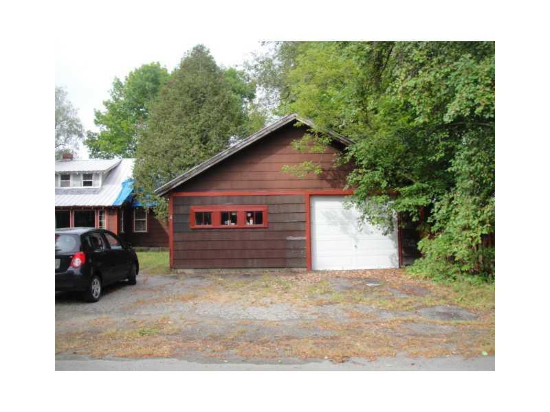 28 Summer Street Milo, ME 04463 - Photo 2 of 2 Parking Lot/Garage.