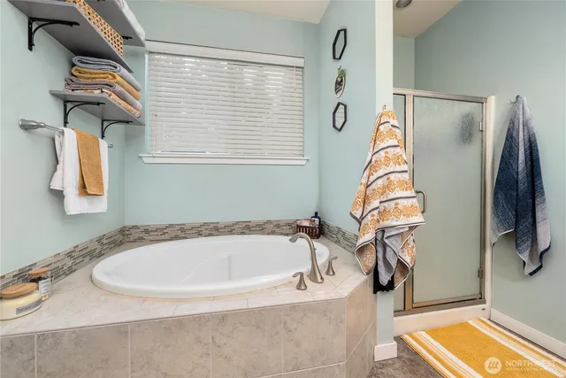 a bathroom with sinks granite countertop double vanity sinks and a mirror
