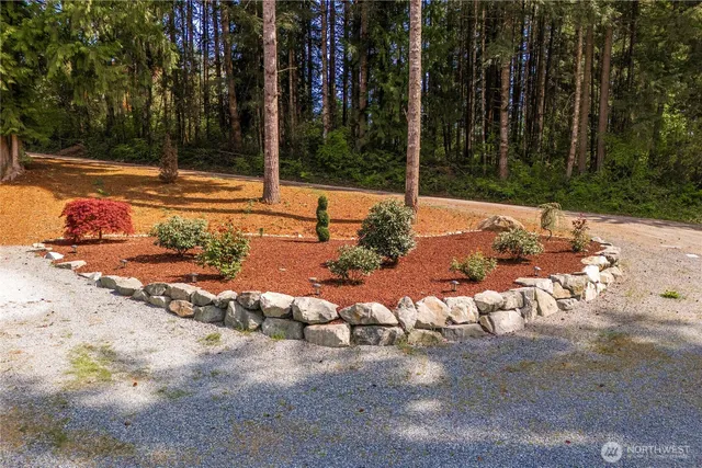 a view of a backyard of the house