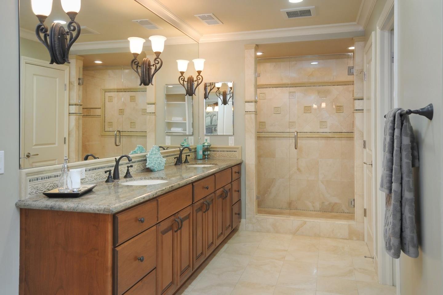 738 Springer Road Los Altos, CA 94024 - Photo 11 of 25 a bathroom with a granite countertop shower sink and mirror