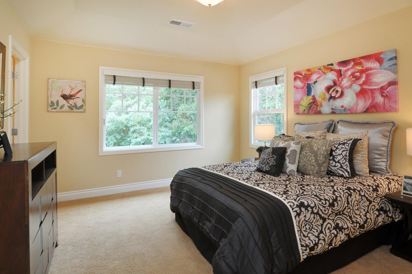 738 Springer Road Los Altos, CA 94024 - Photo 15 of 25 a bedroom with a large bed and a window