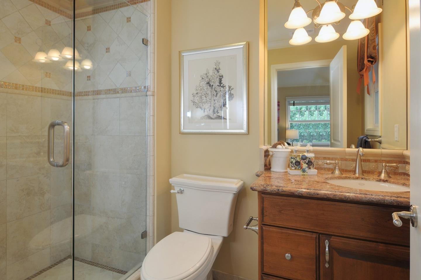 738 Springer Road Los Altos, CA 94024 - Photo 17 of 25 a bathroom with a sink a toilet and shower