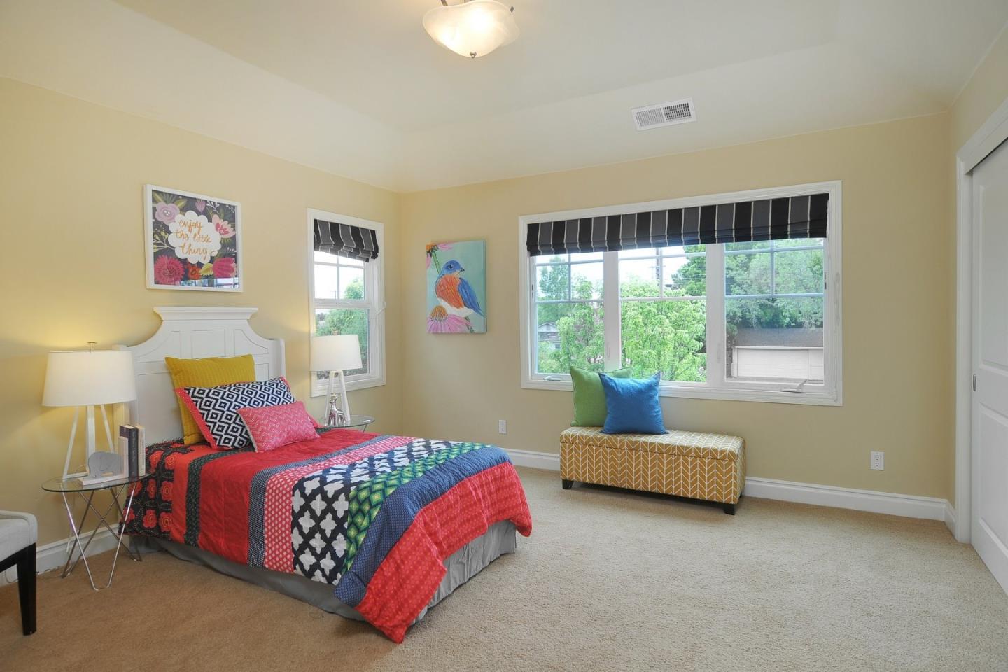 738 Springer Road Los Altos, CA 94024 - Photo 21 of 25 a bedroom with a bed and a couch