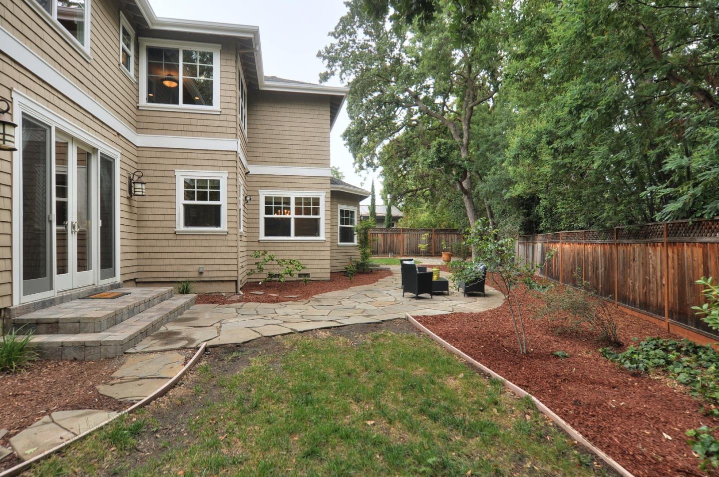 738 Springer Road Los Altos, CA 94024 - Photo 23 of 25 a view of a backyard with sitting area