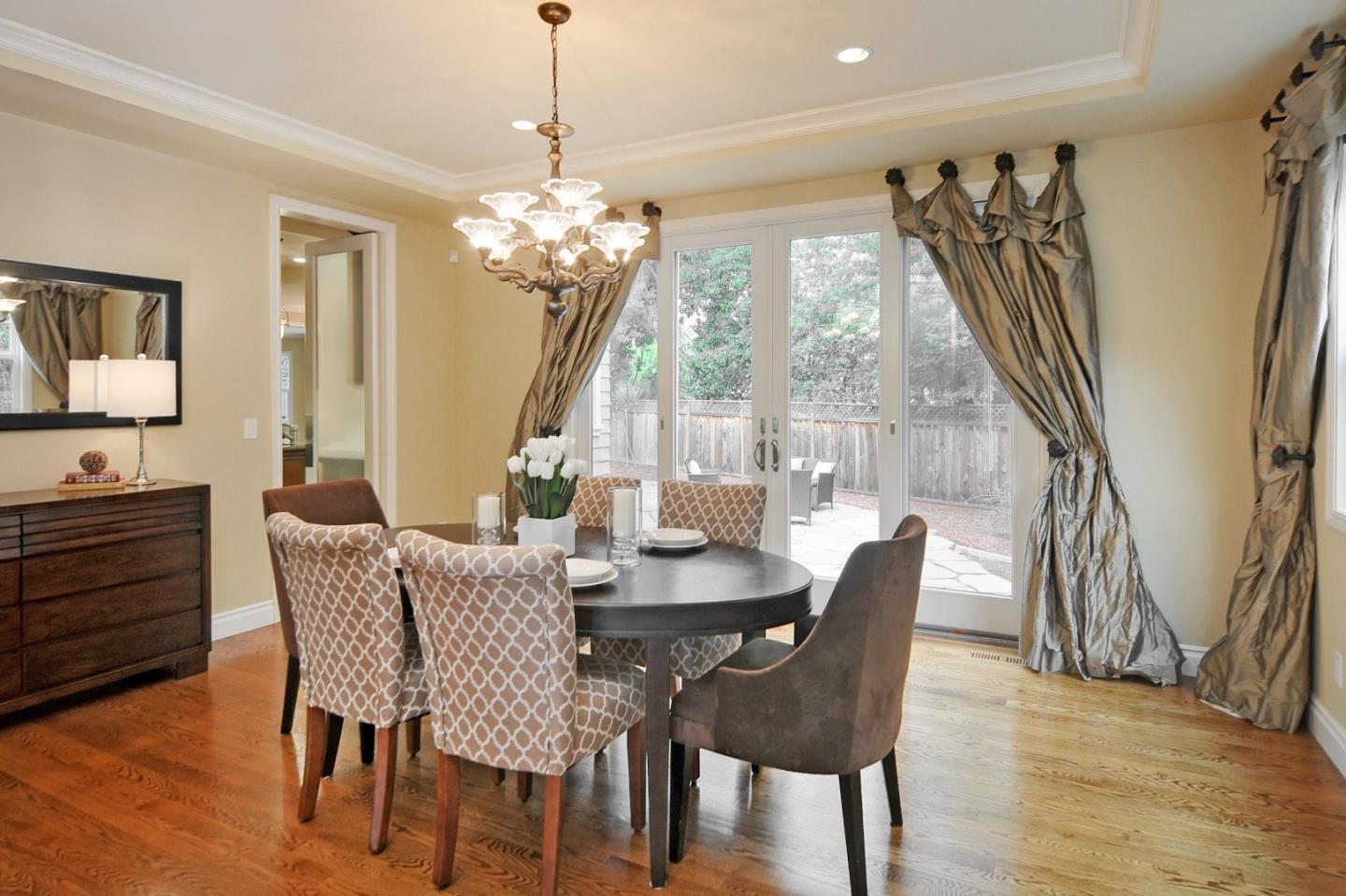 738 Springer Road Los Altos, CA 94024 - Photo 4 of 25 a view of a dining room with furniture window and wooden floor