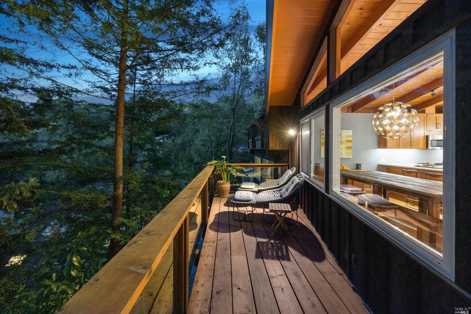 a view of balcony with furniture