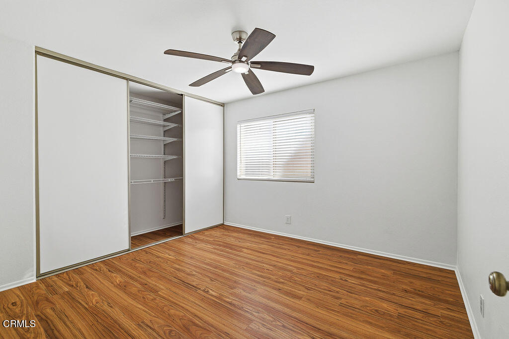 4024 Cliffrose Avenue Moorpark, CA 93021 - Photo 29 of 40 a view of empty room with wooden floor