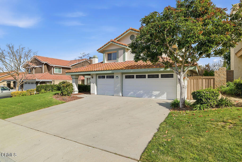 4024 Cliffrose Avenue Moorpark, CA 93021 - Photo 6 of 40 front view of a house with a yard