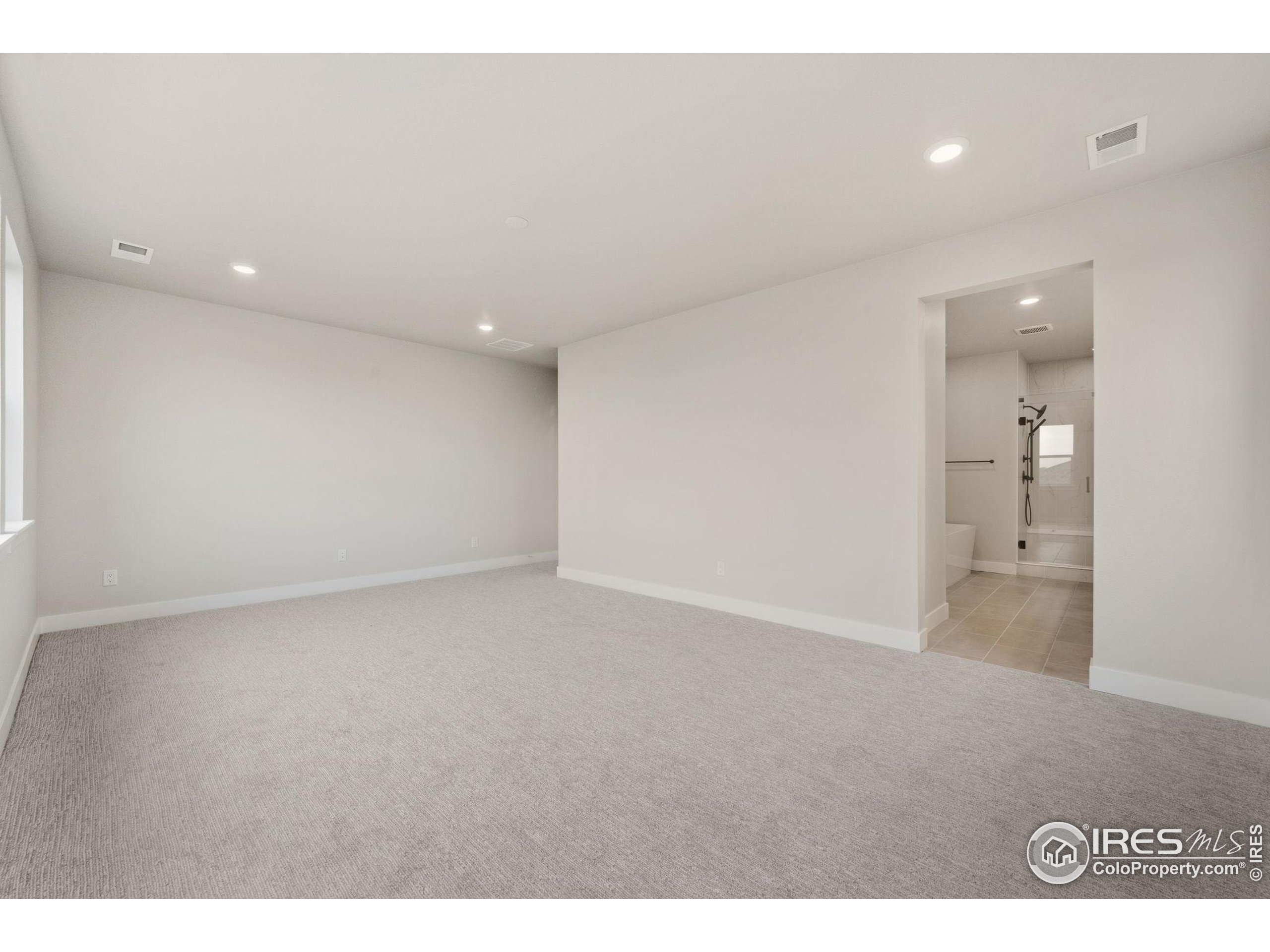 1675 Sundown Run Drive Windsor, CO 80550 - Photo 14 of 15 a view of an empty room